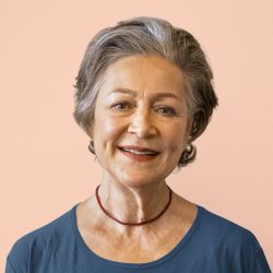 senior-woman-smiling-brightly-with-blue-top-2026-03-08-22-56-12-utc (1)